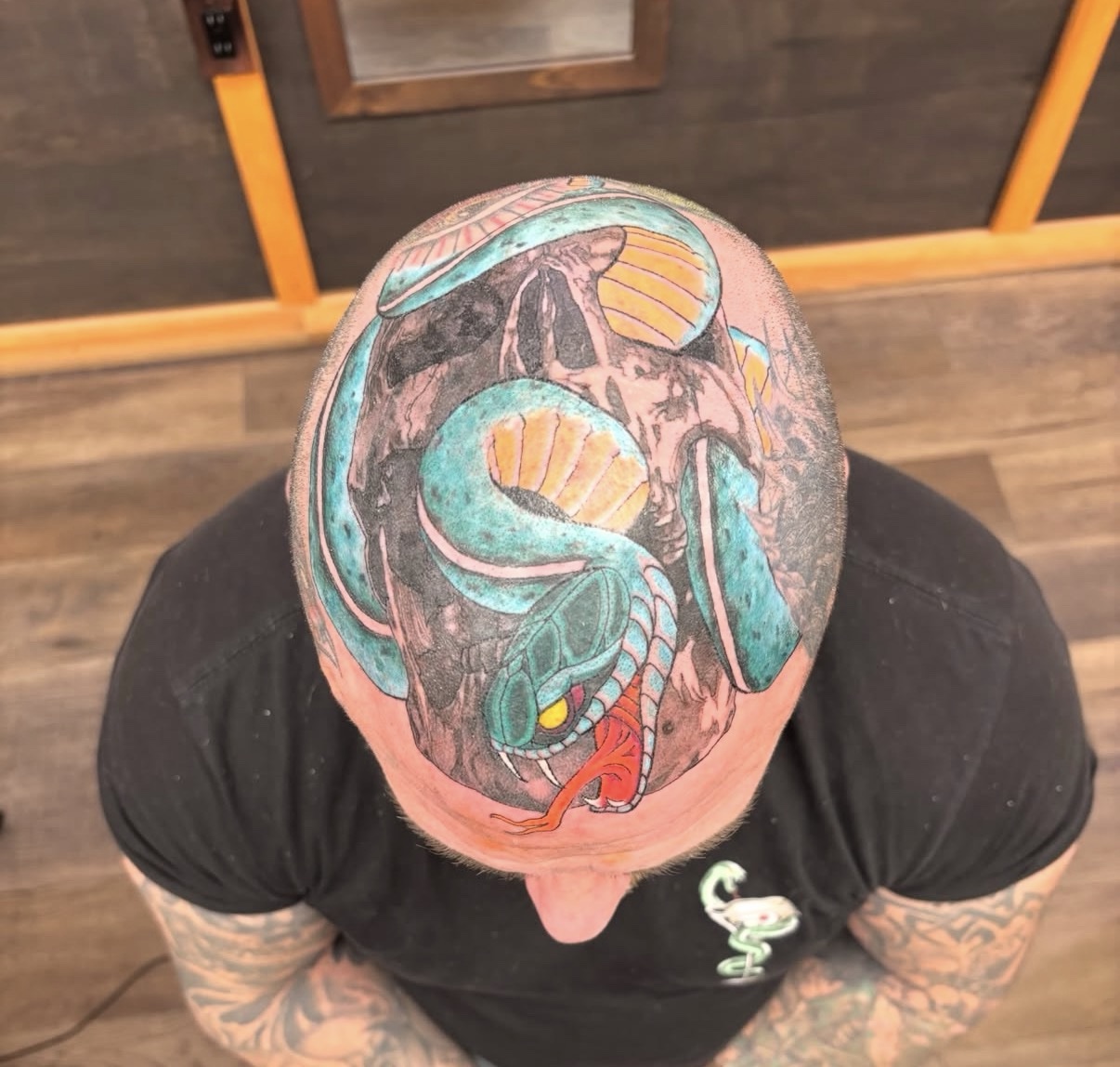 Snake skull head tattoo